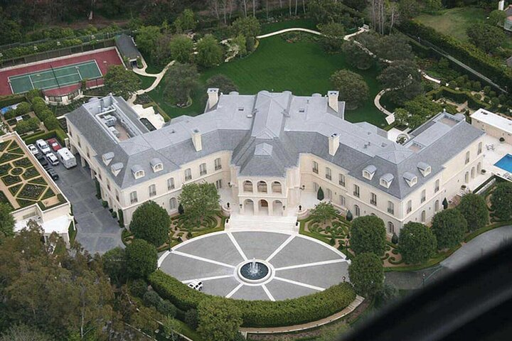 Explore opulent estates behind gated walls showcasing luxurious lifestyles. Marvel at sprawling grounds and exquisite architecture as you journey through the glamorous neighborhoods of Hollywood's elite.